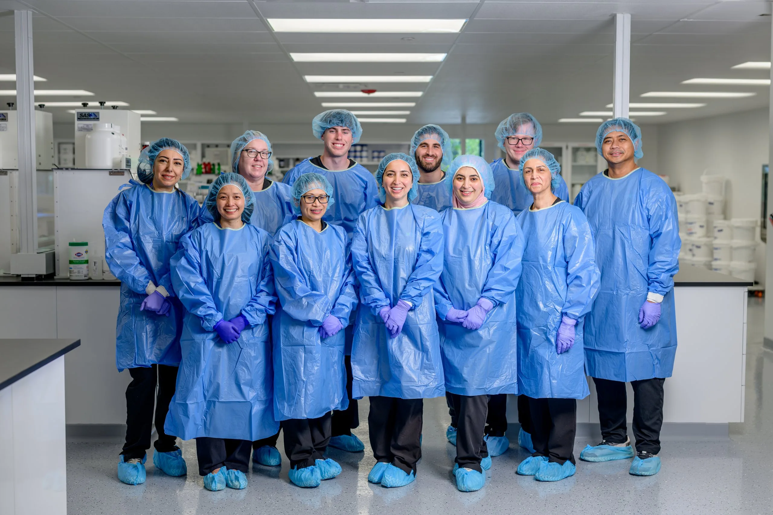 The MediVera compounding team gowned in sterile apparel inside the Troy, Michigan cleanroom