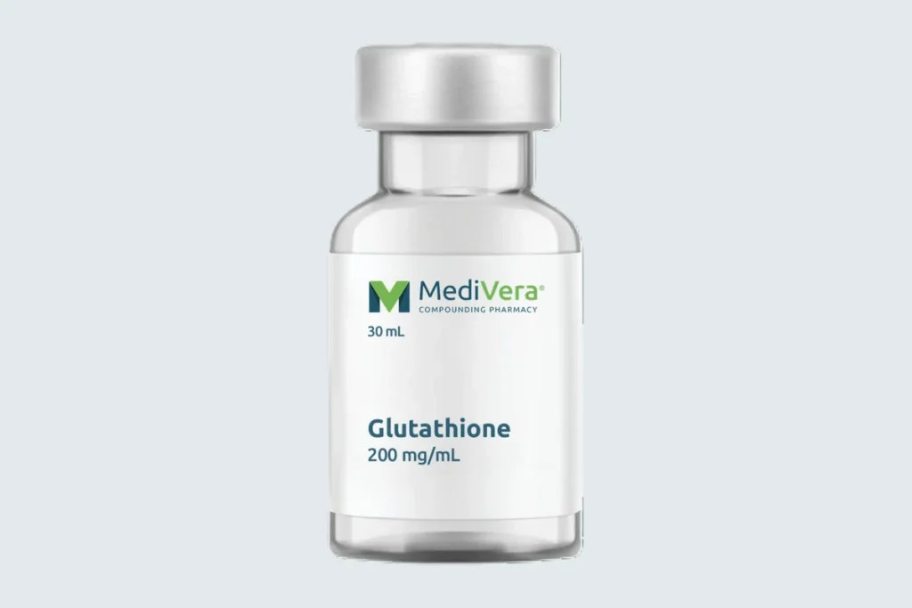 Labeled MediVera glutathione injection vial on a pale cool-gray studio background