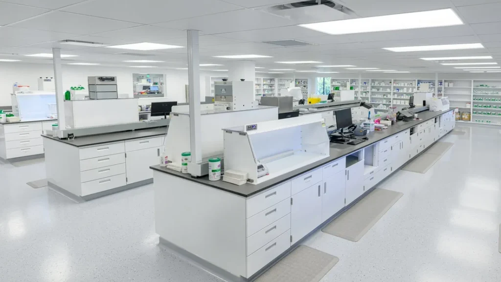 MediVera compounding laboratory with clean white workbenches and dispensing equipment