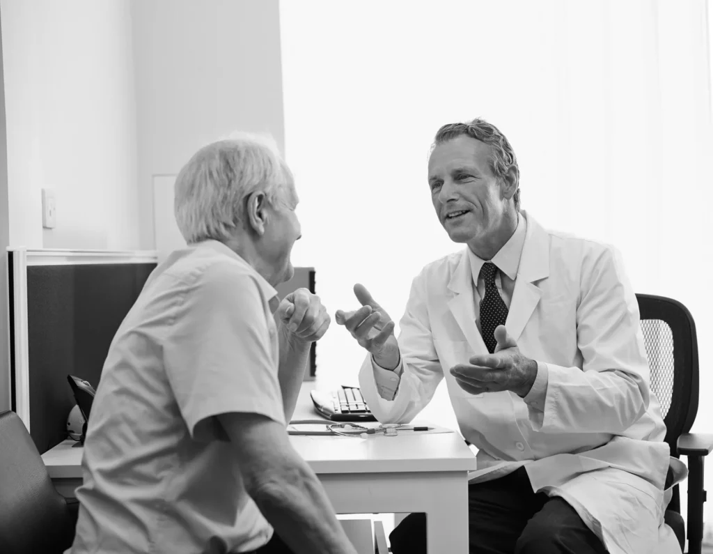 Healthcare professionals reviewing quality standards