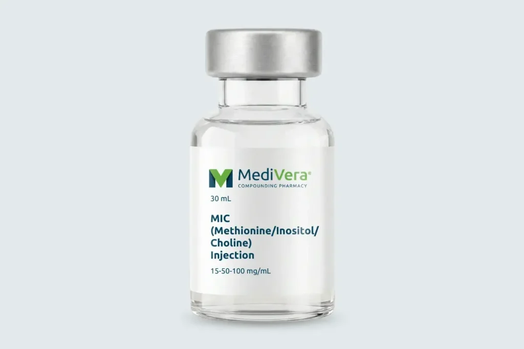 Labeled MediVera MIC injection vial on a pale cool-gray studio background