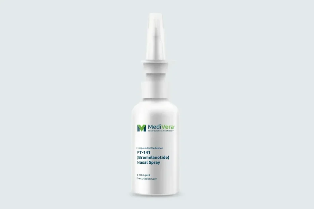 Labeled MediVera PT-141 nasal spray bottle on a pale cool-gray studio background