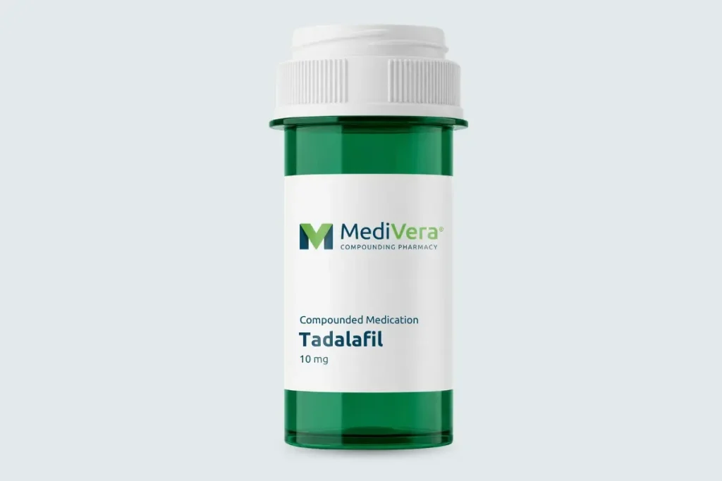 Green MediVera tadalafil medication bottle on a pale cool-gray studio background